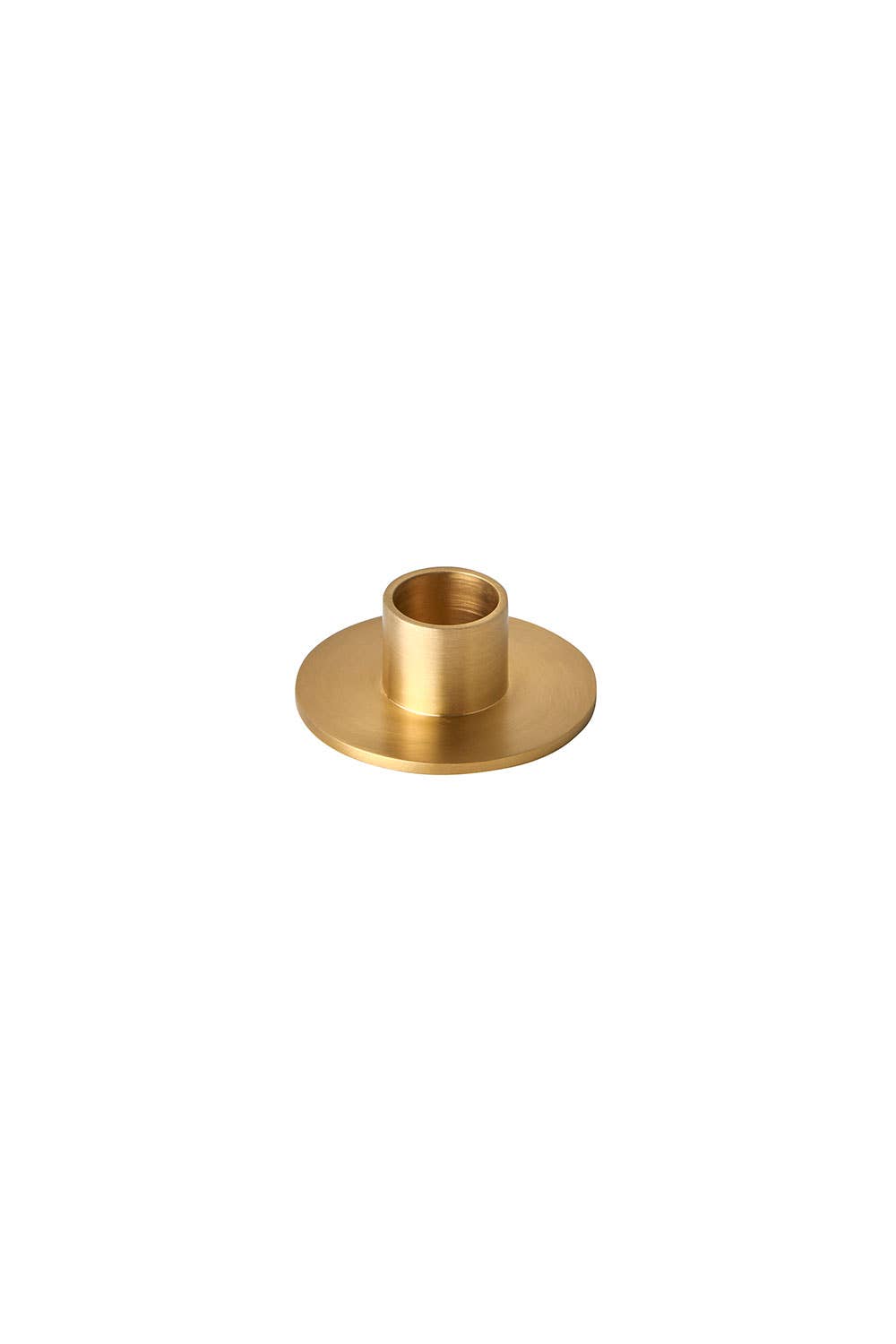Fog Linen Work brass candle holder with a lit candle