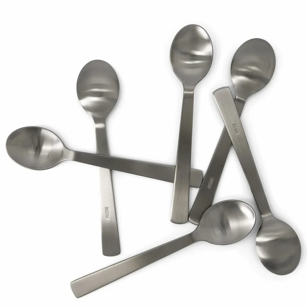 ACME oval table spoon in brushed stainless steel, detail view