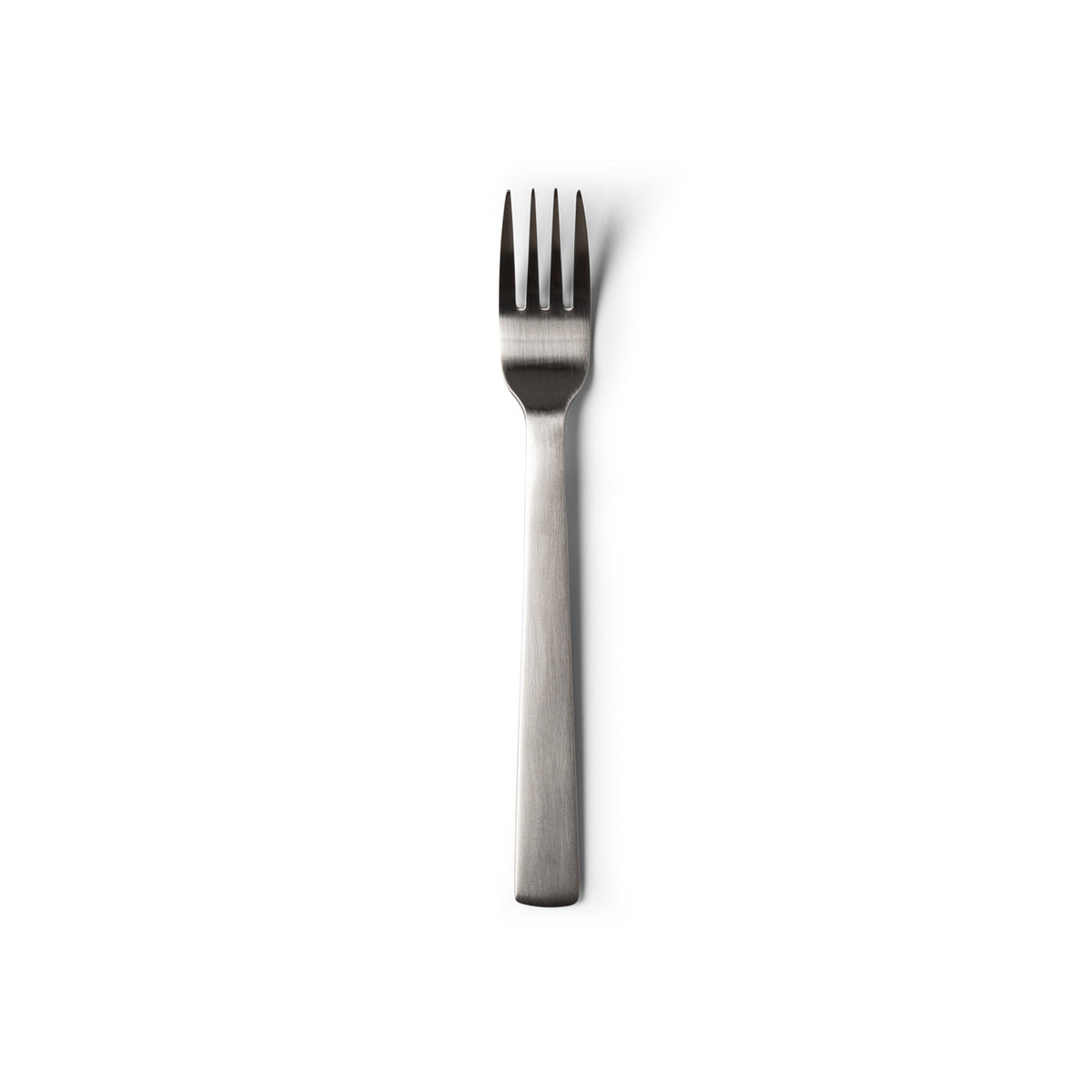 ACME brushed stainless table fork, close view of the four tapered prongs