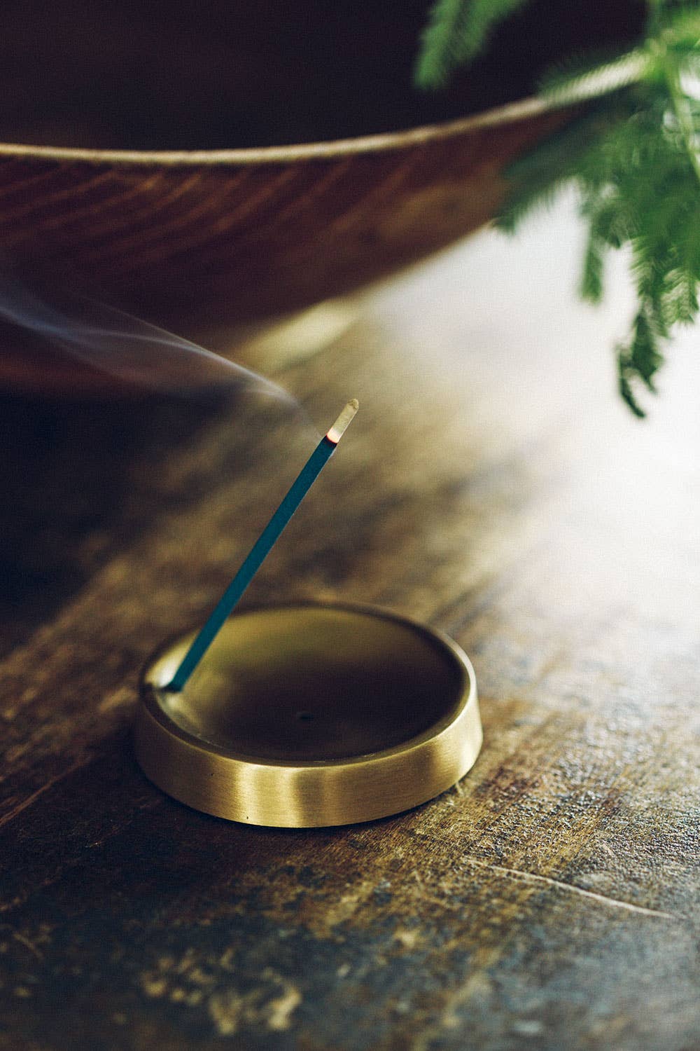 Fog Linen Work round brass incense stand in use